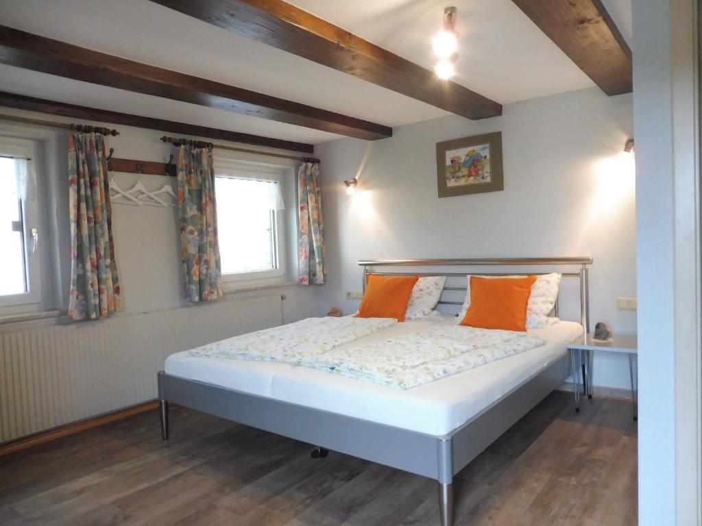 Postel nebo postele na pokoji v ubytování Gästehaus Grath