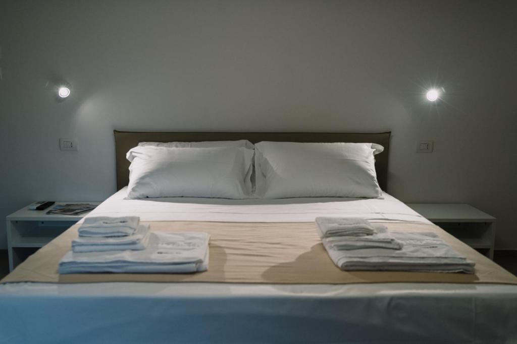 Postel nebo postele na pokoji v ubytování MaisonMe