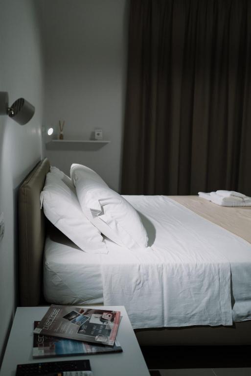 Postel nebo postele na pokoji v ubytování MaisonMe