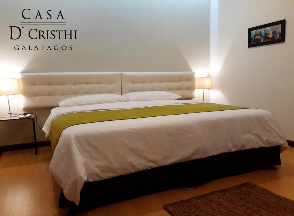 Postel nebo postele na pokoji v ubytování Casa D´Cristhi