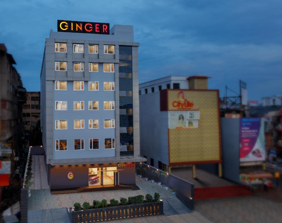 a building with a sign on top of it at Ginger Patna in Patna