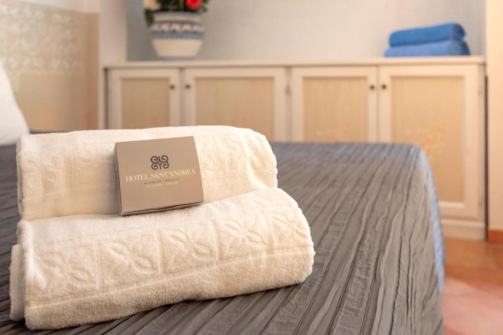 Postel nebo postele na pokoji v ubytování Boutique Hotel Sant'Andrea & Relais