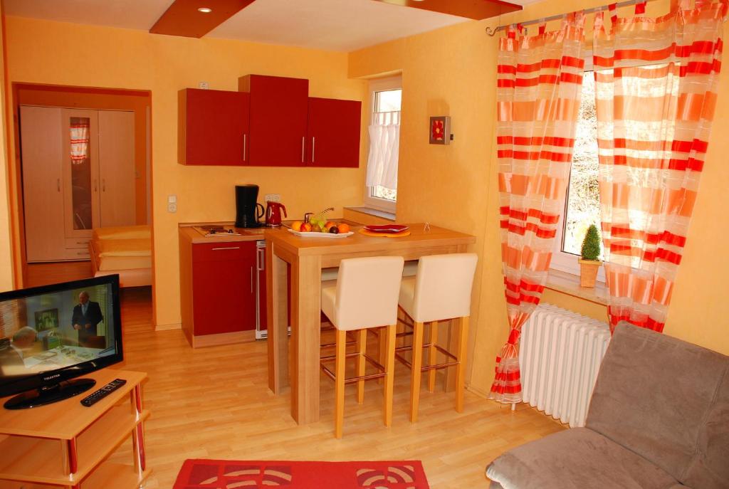 Kuchyň nebo kuchyňský kout v ubytování Hotel Heissinger