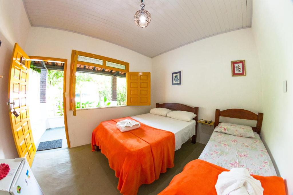 מיטה או מיטות בחדר ב-Coroaci Beach House