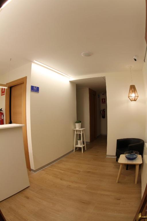 TV a/nebo společenská místnost v ubytování Hostal Mónaco