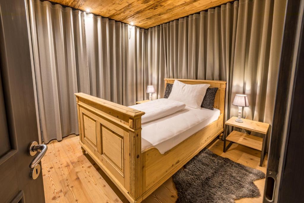 Postel nebo postele na pokoji v ubytování Chalet Avidea Secret