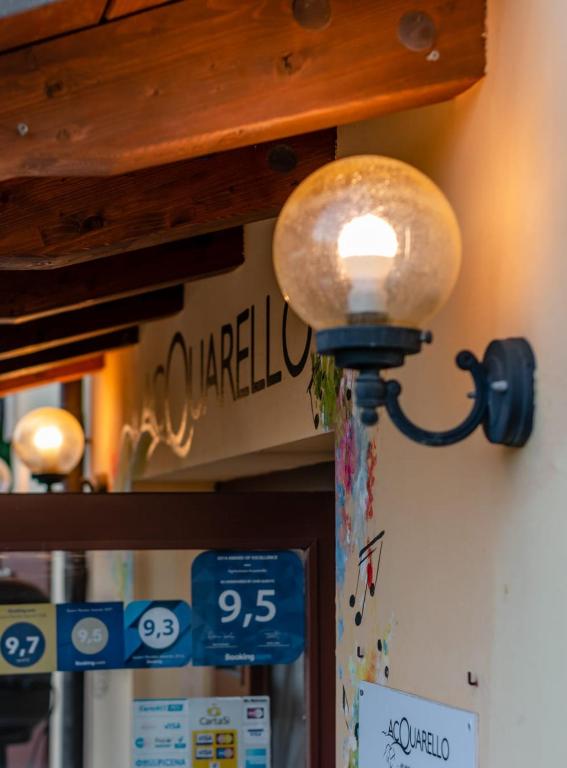 Certifikát, hodnocení, plakát nebo jiný dokument vystavený v ubytování Acquarello