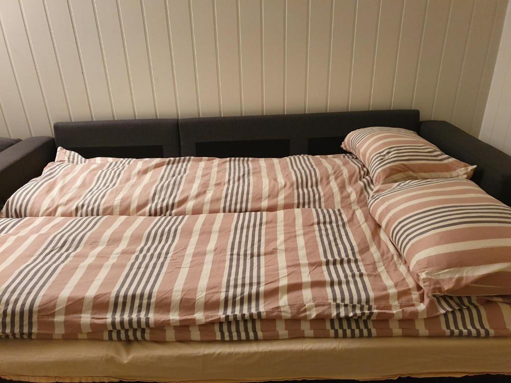 Postel nebo postele na pokoji v ubytování Bårdshaug Studio Apartment