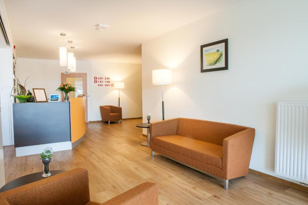 Posezení v ubytování Hotel Elbblick Garni