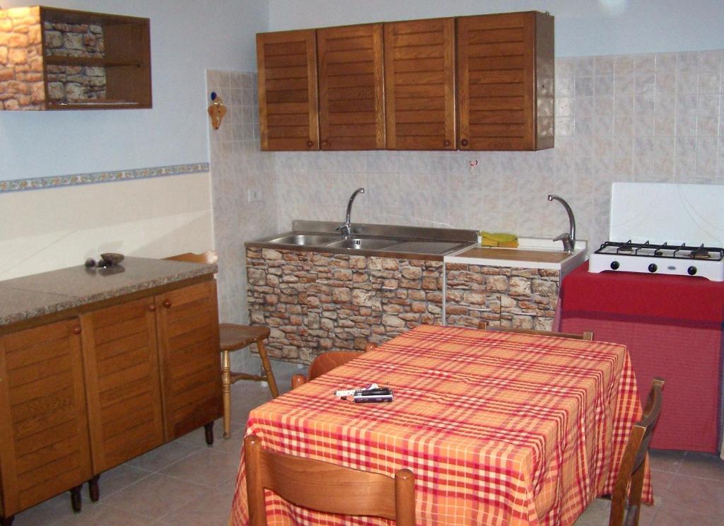 Kuchyň nebo kuchyňský kout v ubytování B&B Mare Di S. Lucia