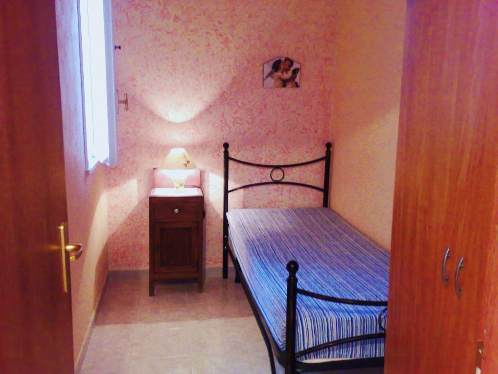 Postel nebo postele na pokoji v ubytování B&B Mare Di S. Lucia