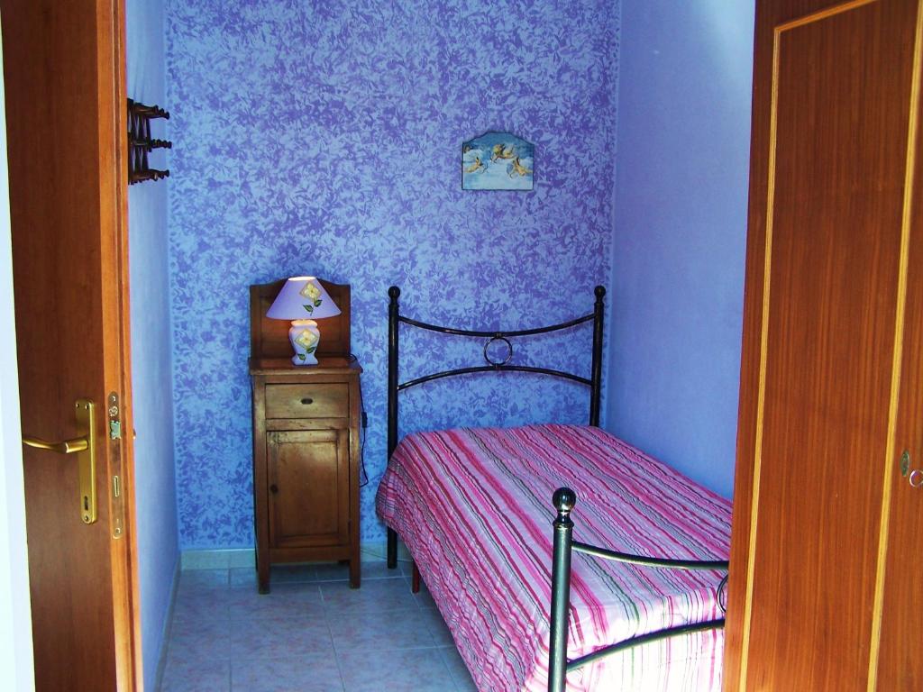 Postel nebo postele na pokoji v ubytování B&B Mare Di S. Lucia