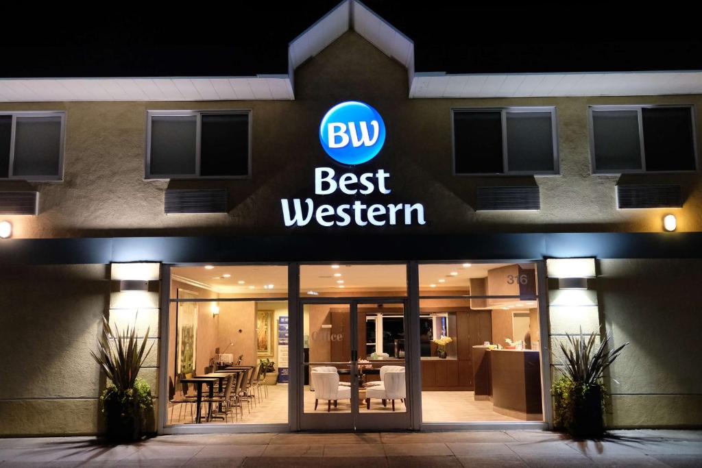 a building with a sign that reads best western at Best Western Inn in Redwood City