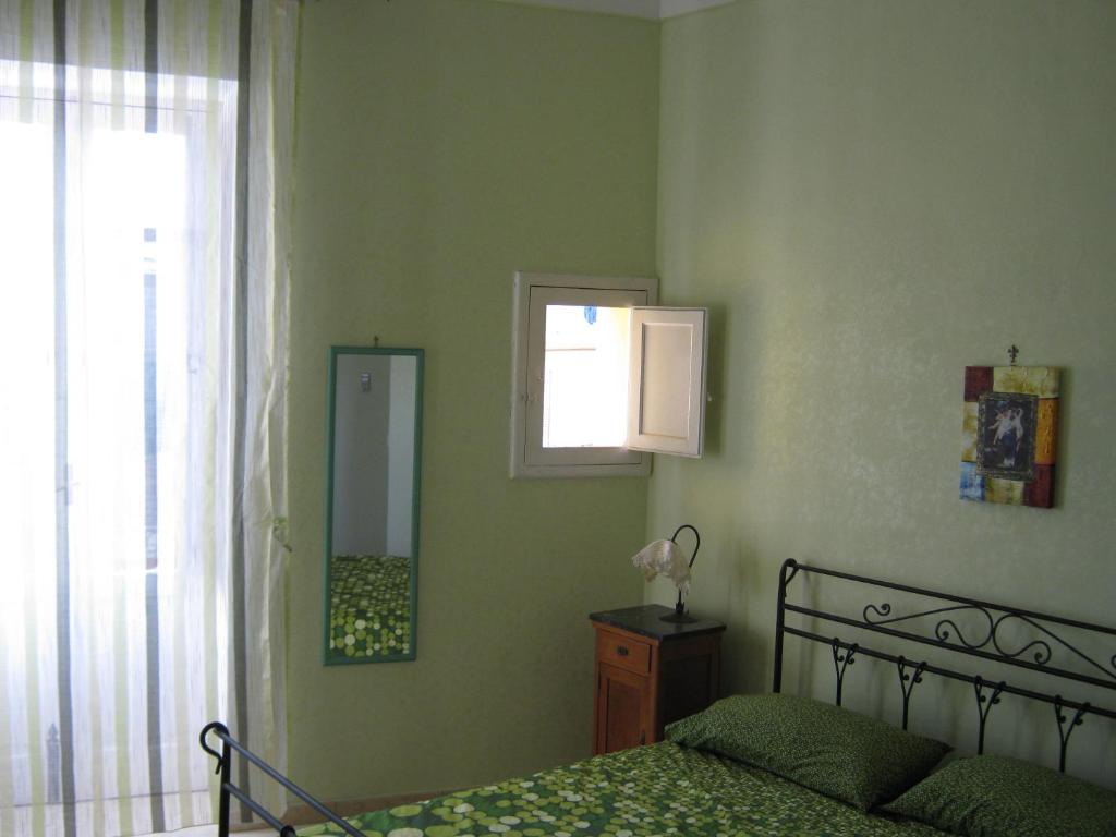 Postel nebo postele na pokoji v ubytování B&B Mare Di S. Lucia