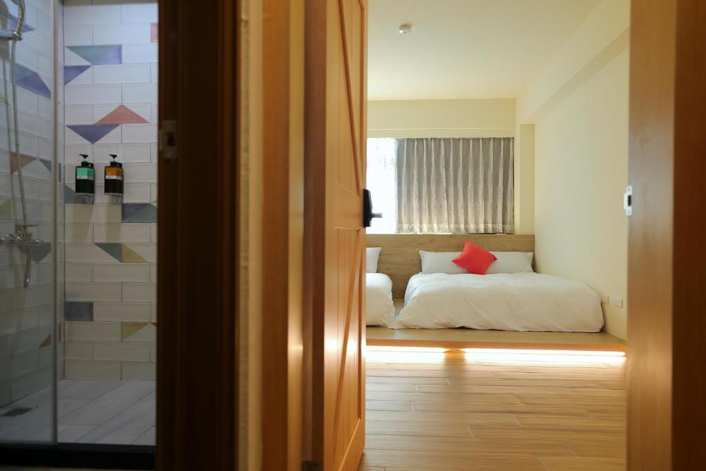 Postel nebo postele na pokoji v ubytování Colorful Balloons Homestay