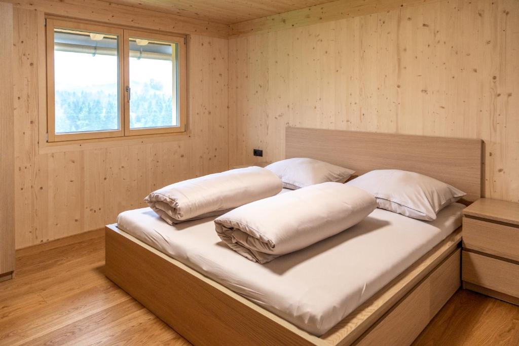 Postel nebo postele na pokoji v ubytování Hus Bündt