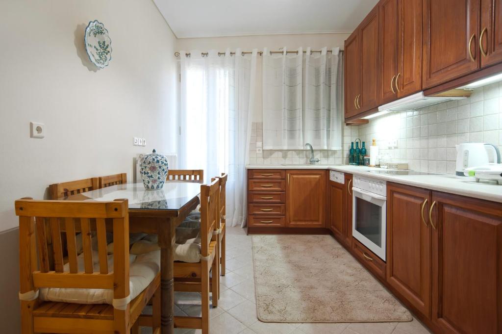 Kuchyň nebo kuchyňský kout v ubytování Elia Apartments Chrisso