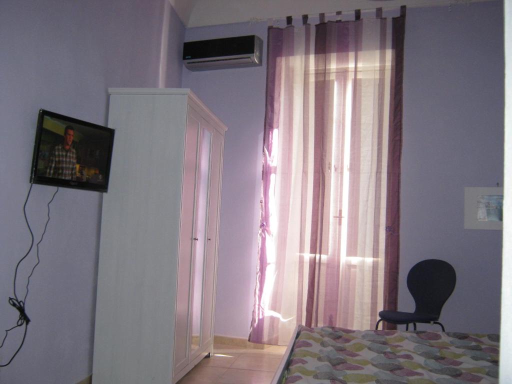 TV a/nebo společenská místnost v ubytování B&B Mare Di S. Lucia