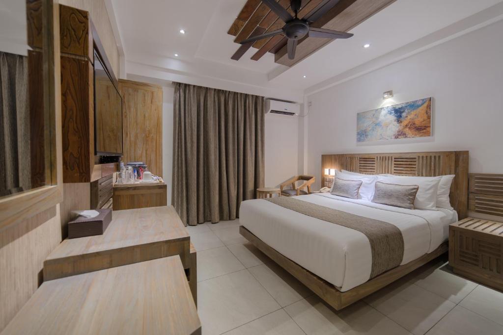 Postel nebo postele na pokoji v ubytování Hotel Ocean Grand at Hulhumale