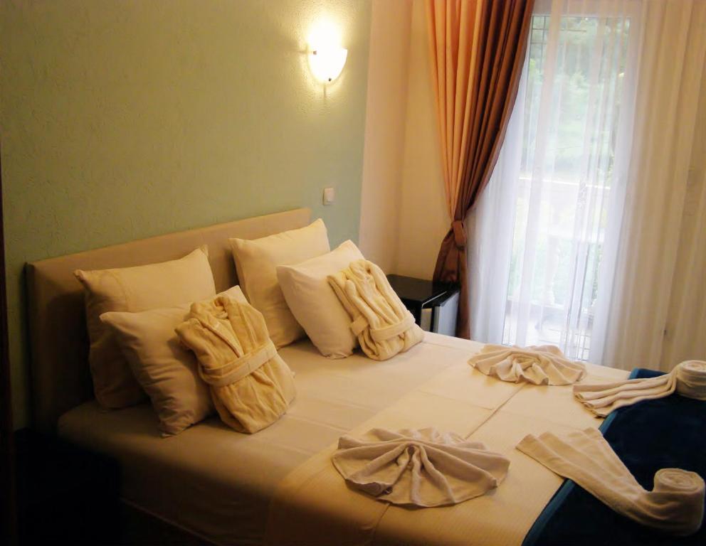 Postel nebo postele na pokoji v ubytování Hotel Wellness & Spa Angelo Gabriel