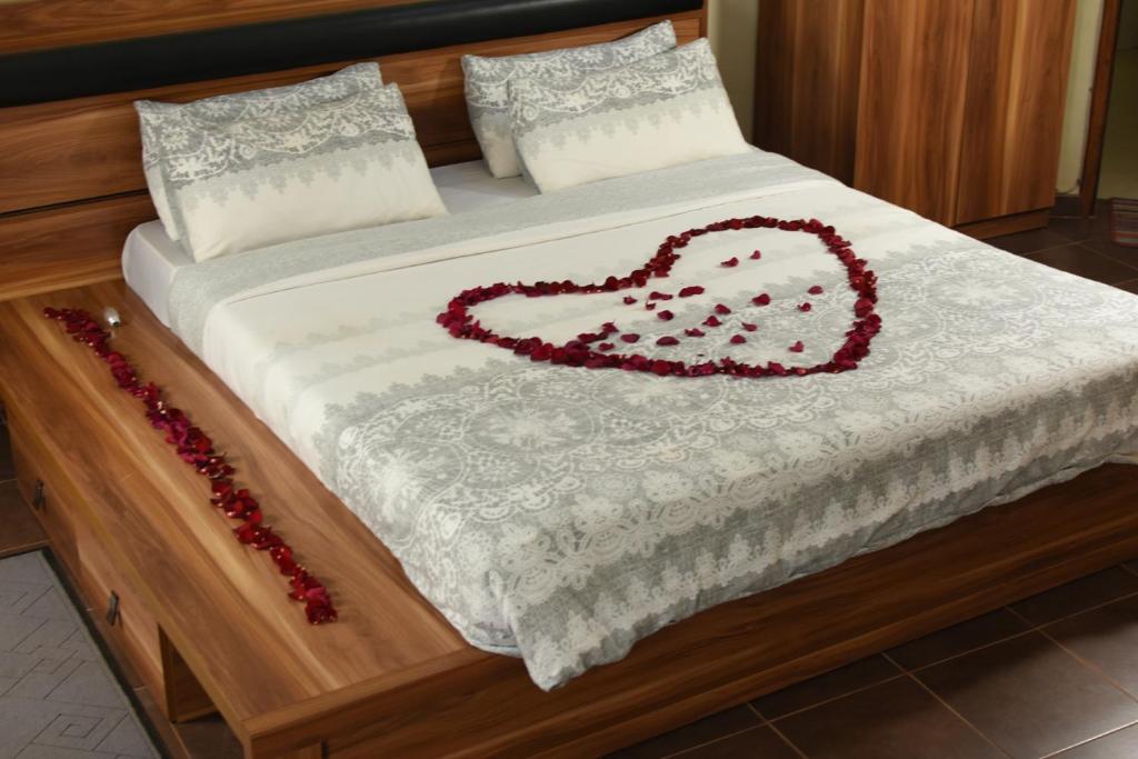 Postel nebo postele na pokoji v ubytování Biyem Hotel
