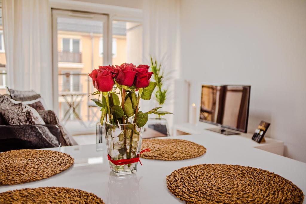 Posedenie v ubytovaní Apartamenty Homely Place Koziołki - Stary Rynek - Parking