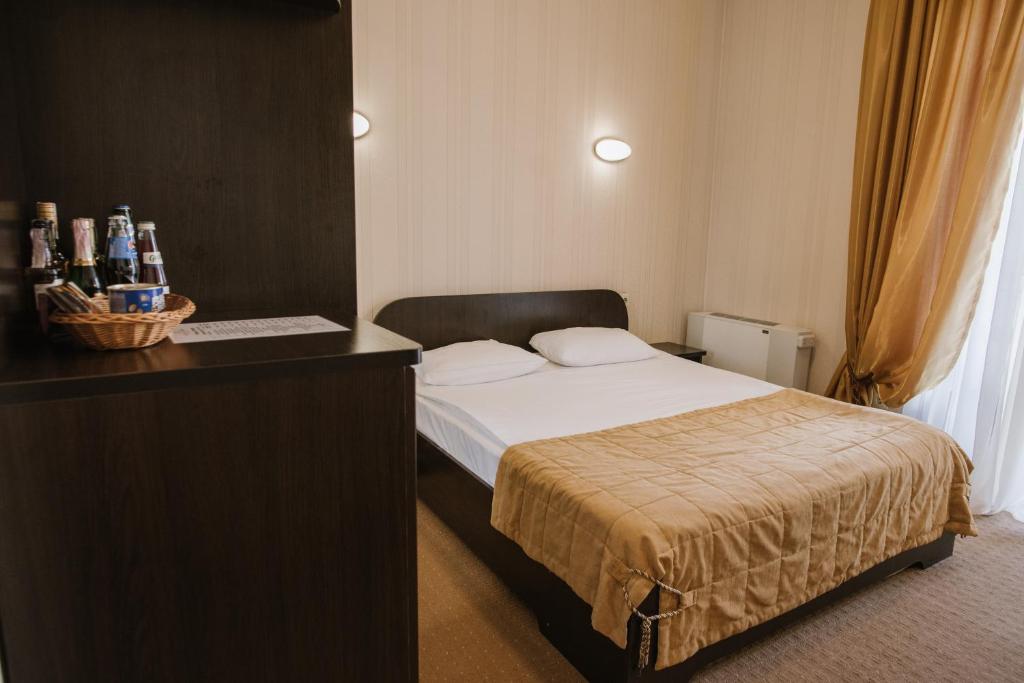 Postel nebo postele na pokoji v ubytování Курортний Готель Золота Корона