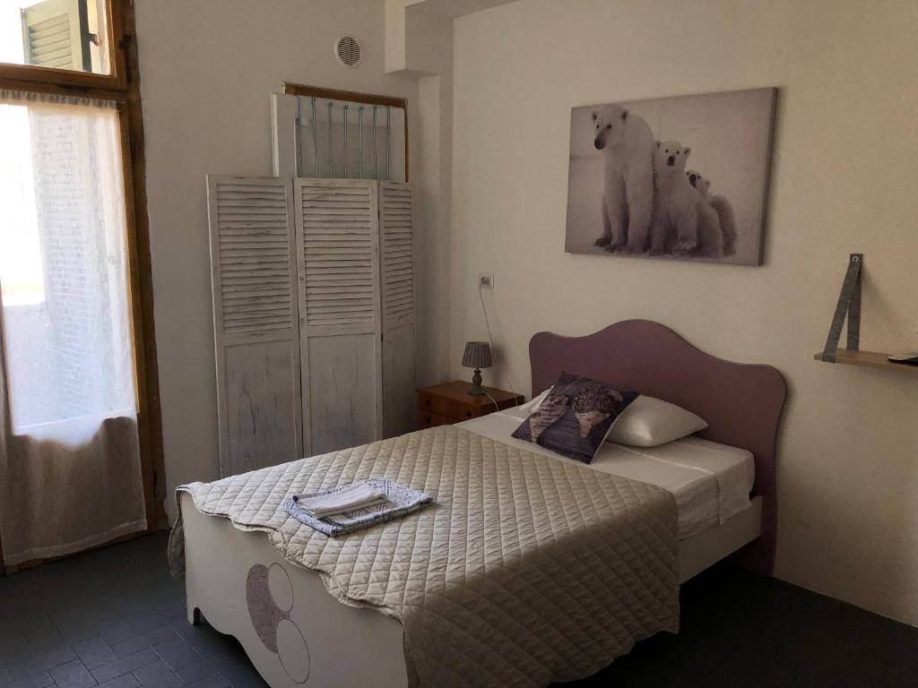 Postel nebo postele na pokoji v ubytování Dreaming Verona Rooms
