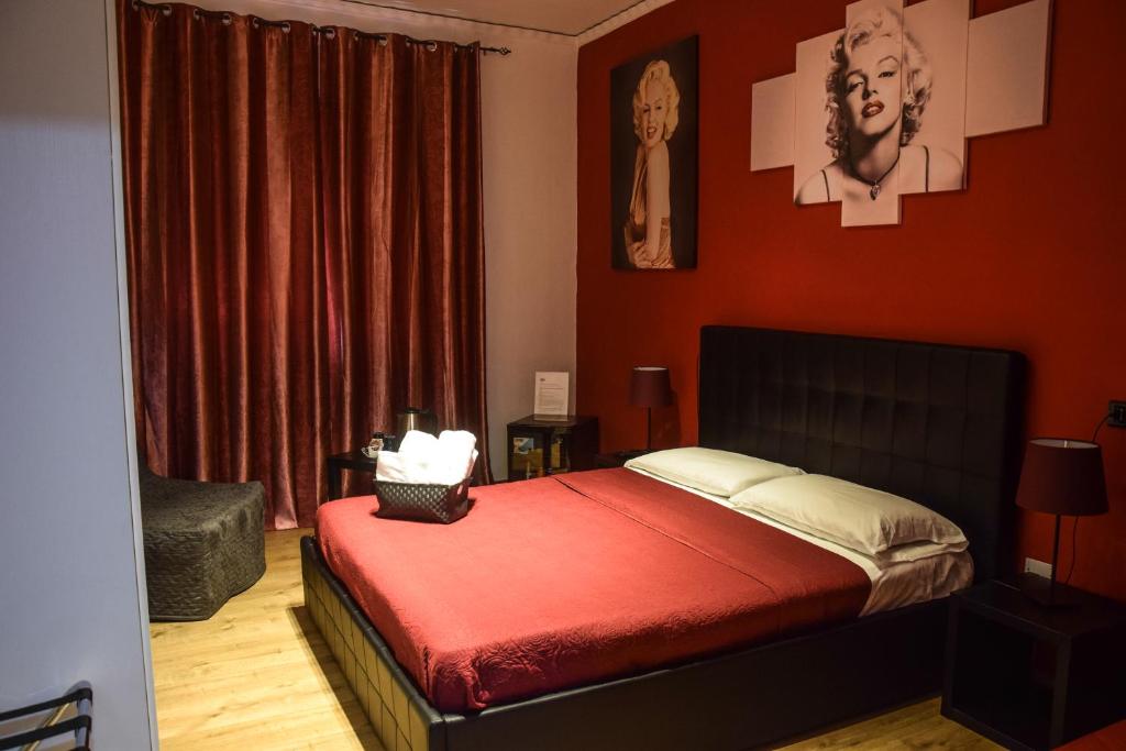 Postel nebo postele na pokoji v ubytování Hotel Kennedy