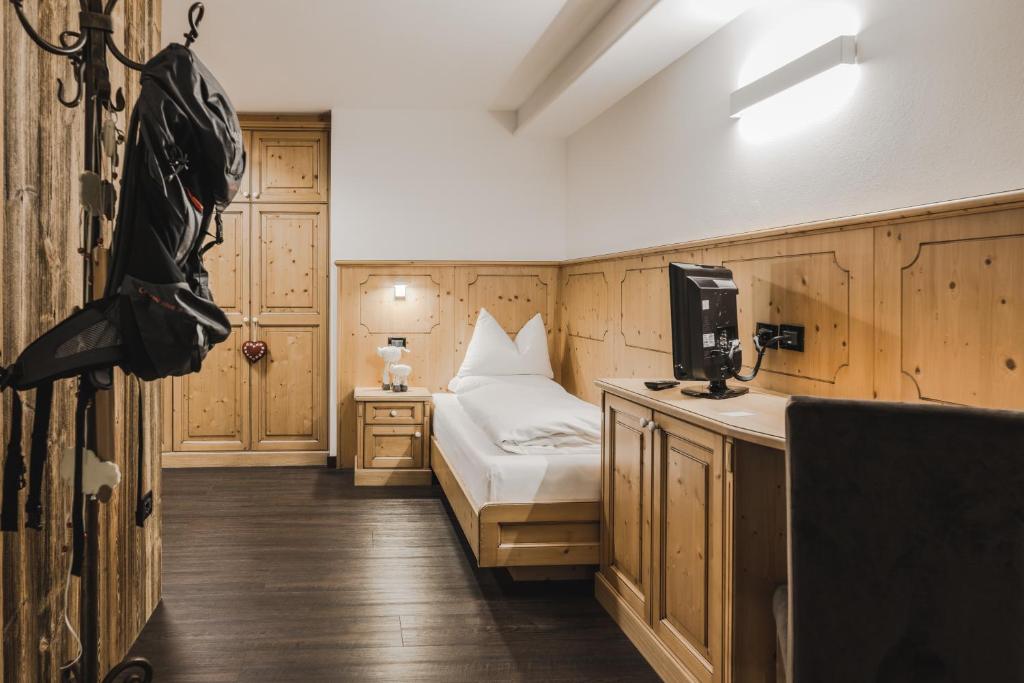 Postel nebo postele na pokoji v ubytování Hotel Chalet S - Dolomites Design - adults recommended