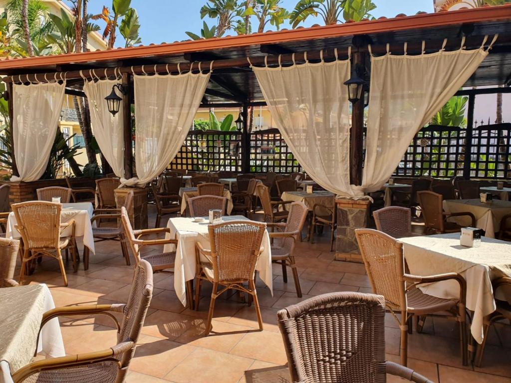 Reštaurácia alebo iné gastronomické zariadenie v ubytovaní B&B Puerto Seguro