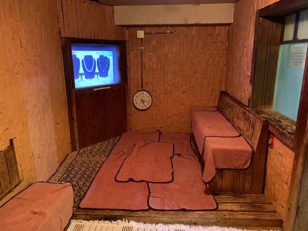 TV a/nebo společenská místnost v ubytování Capsule Hotel 310