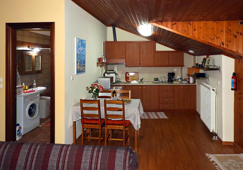 A kitchen or kitchenette at PanoramaLoft - quality, view, sea & mountain