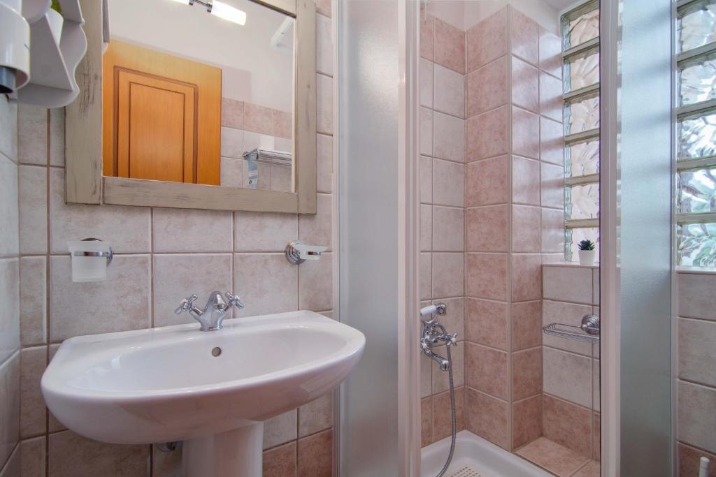 Koupelna v ubytování Xani Hotel
