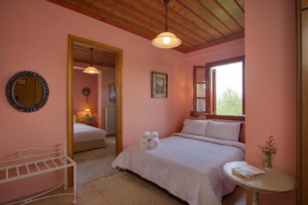 Postel nebo postele na pokoji v ubytování Xani Hotel