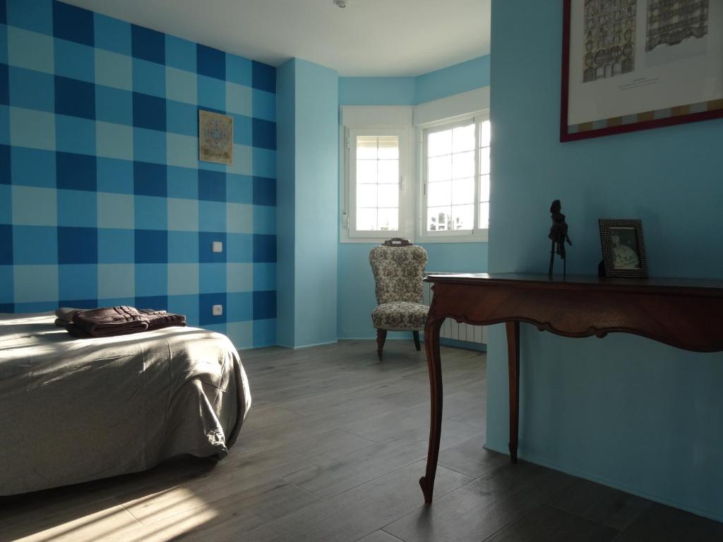 Postel nebo postele na pokoji v ubytování BArcoiris B&B - Adults Men only - SOLO PARA HOMBRES