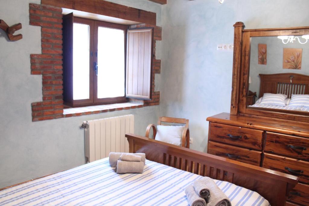 Posteľ alebo postele v izbe v ubytovaní Casa Rural Reserva Saja-Besaya