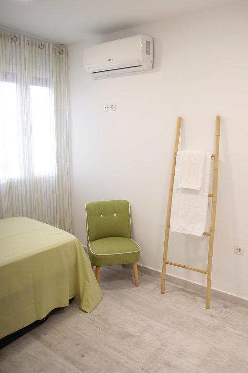 A bed or beds in a room at SHERRY HOME