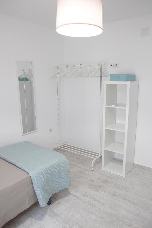 A bed or beds in a room at SHERRY HOME