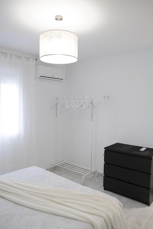 A bed or beds in a room at SHERRY HOME