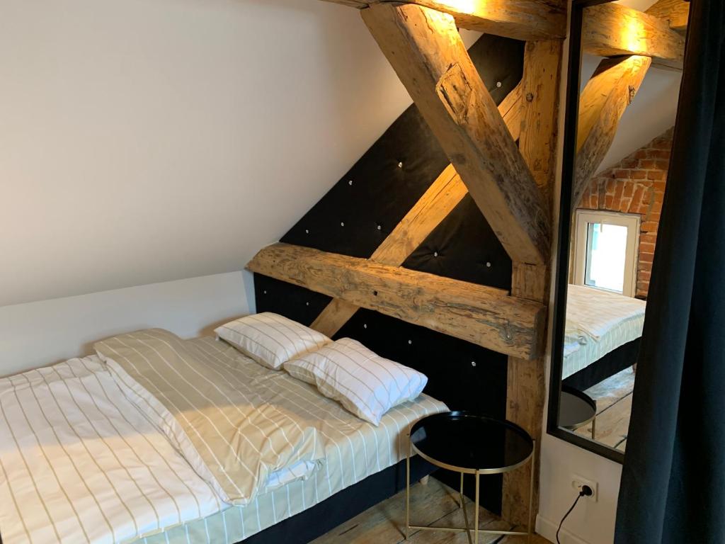 Posteľ alebo postele v izbe v ubytovaní Apartamenty Jęczmienna 29