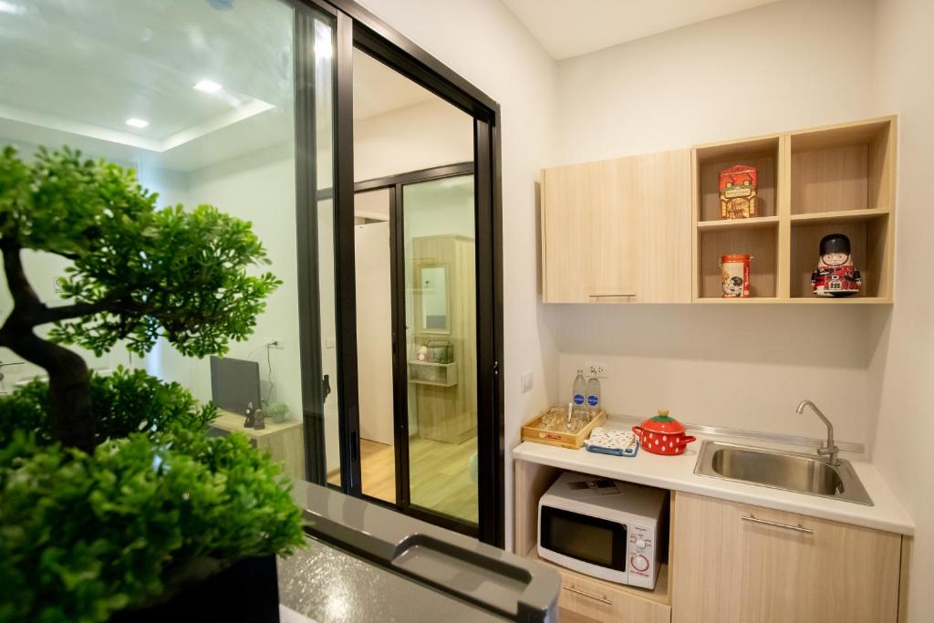 Kuchyň nebo kuchyňský kout v ubytování Casa Coco Hotel