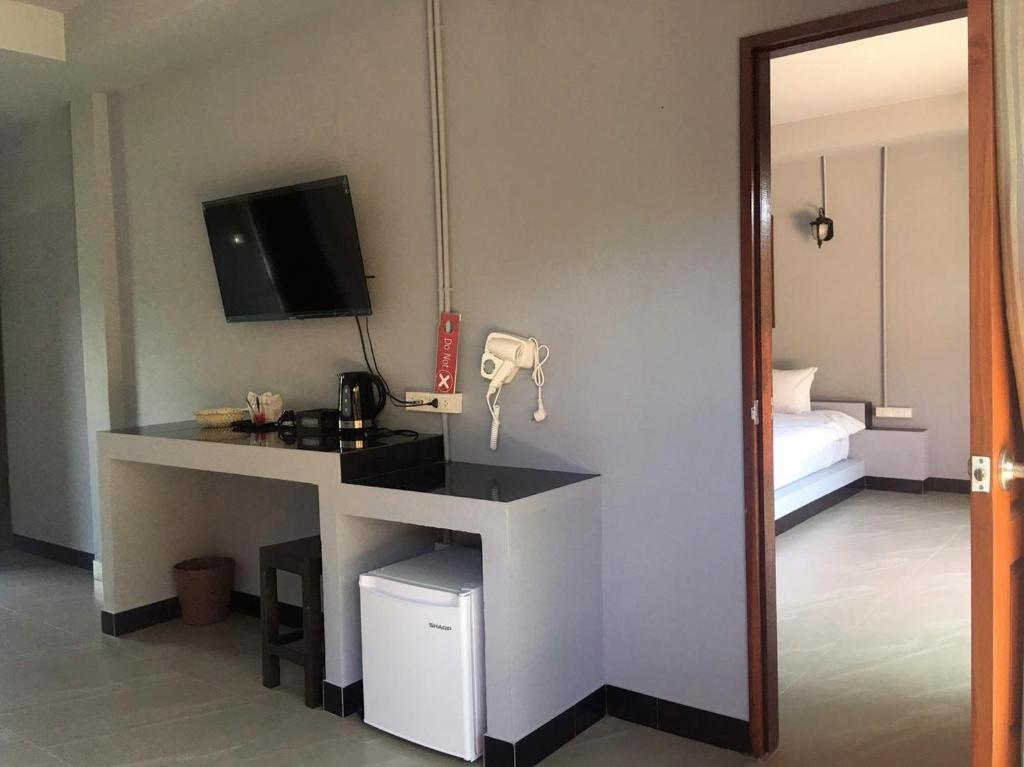 TV a/nebo společenská místnost v ubytování Chomview Resort