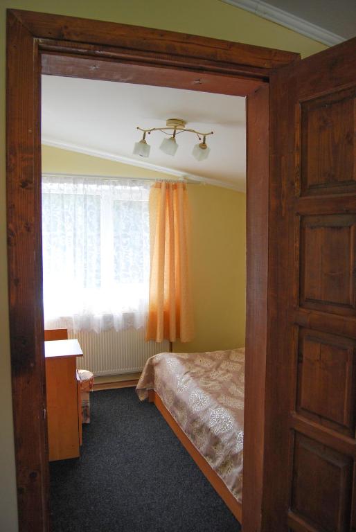 Postel nebo postele na pokoji v ubytování Cheres Hotel