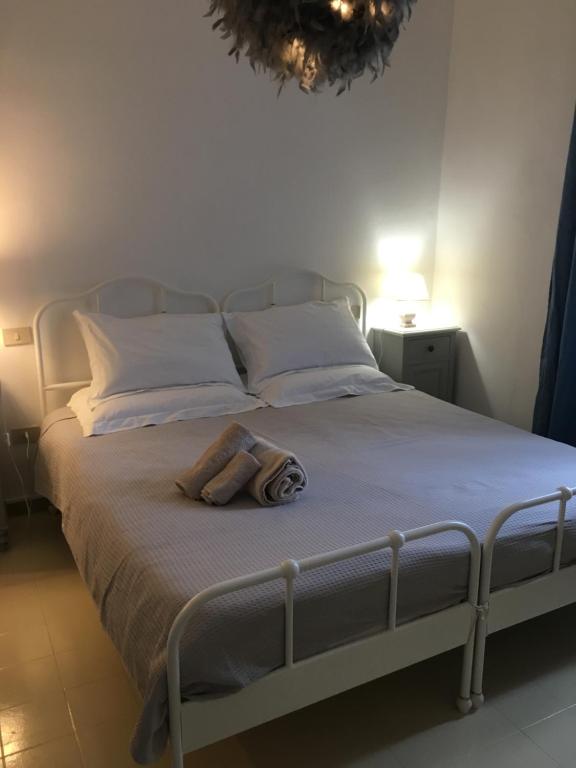 Łóżko lub łóżka w pokoju w obiekcie Via Mazzini
