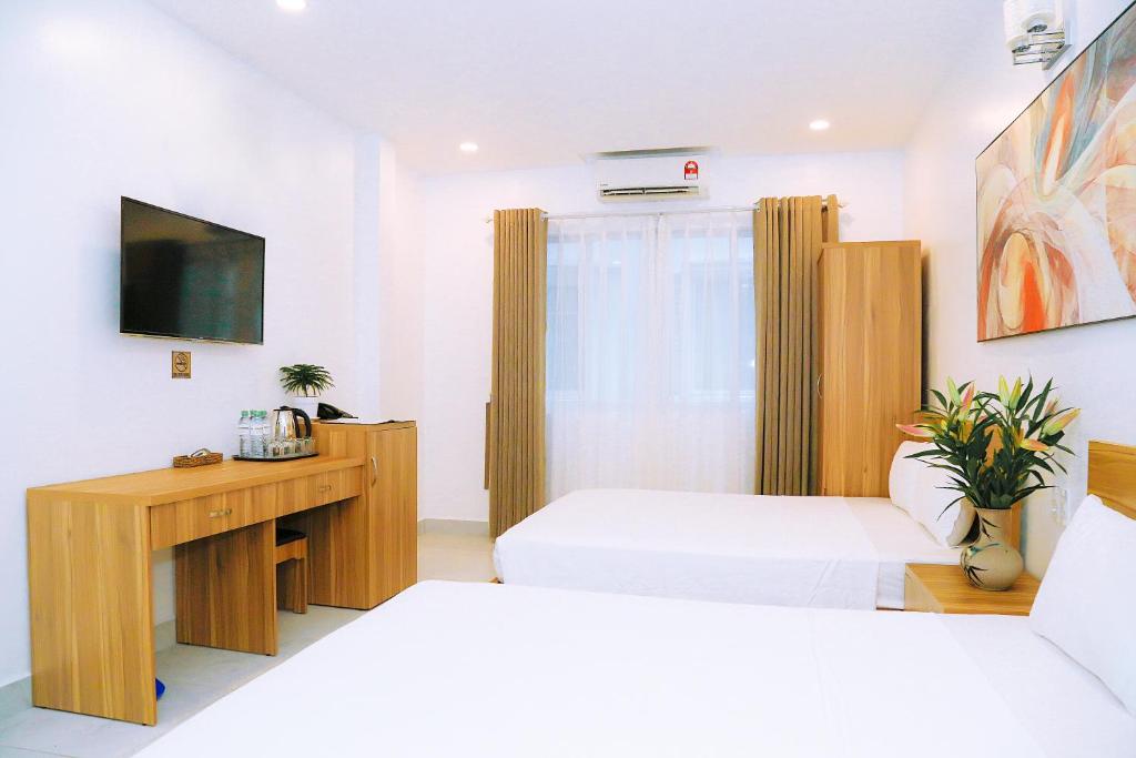 Louis Hotel - Bui Vien Walking Street - Chambre Familiale De Luxe Avec Fenêtre