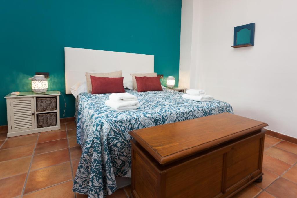 A bed or beds in a room at Casa Larga