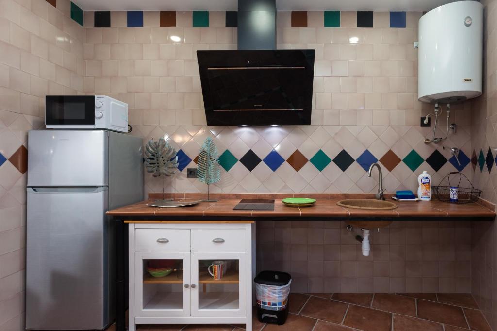 A kitchen or kitchenette at Casa Larga