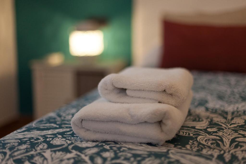 A bed or beds in a room at Casa Larga