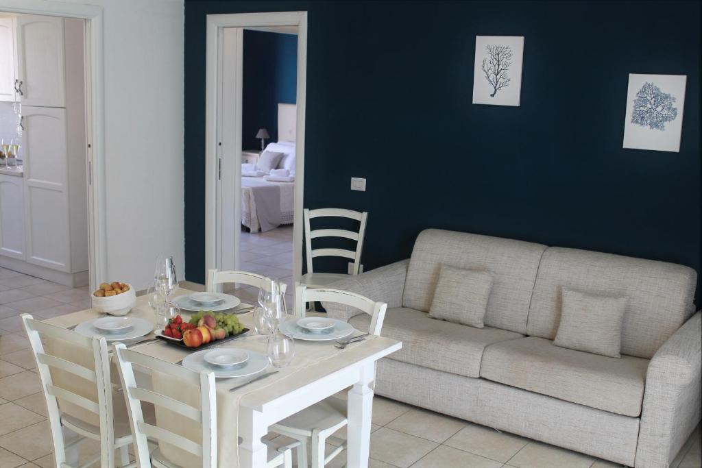Posezení v ubytování AHR Leonis Residence La Maddalena